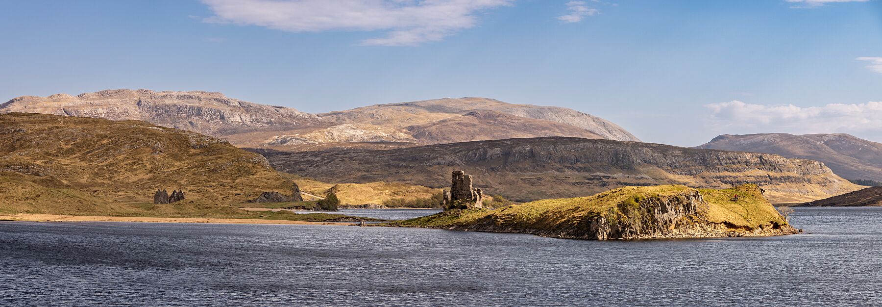 The remnants of Ardvreck Castle, perched on a spit of land in Loch Assynt, surrounded by the Assynt & Coigach mountains.
This beautiful landscape is available in A3, A2 and A1 sizes, as print only, or with a choice of wooden frames in White, Black and Oak.