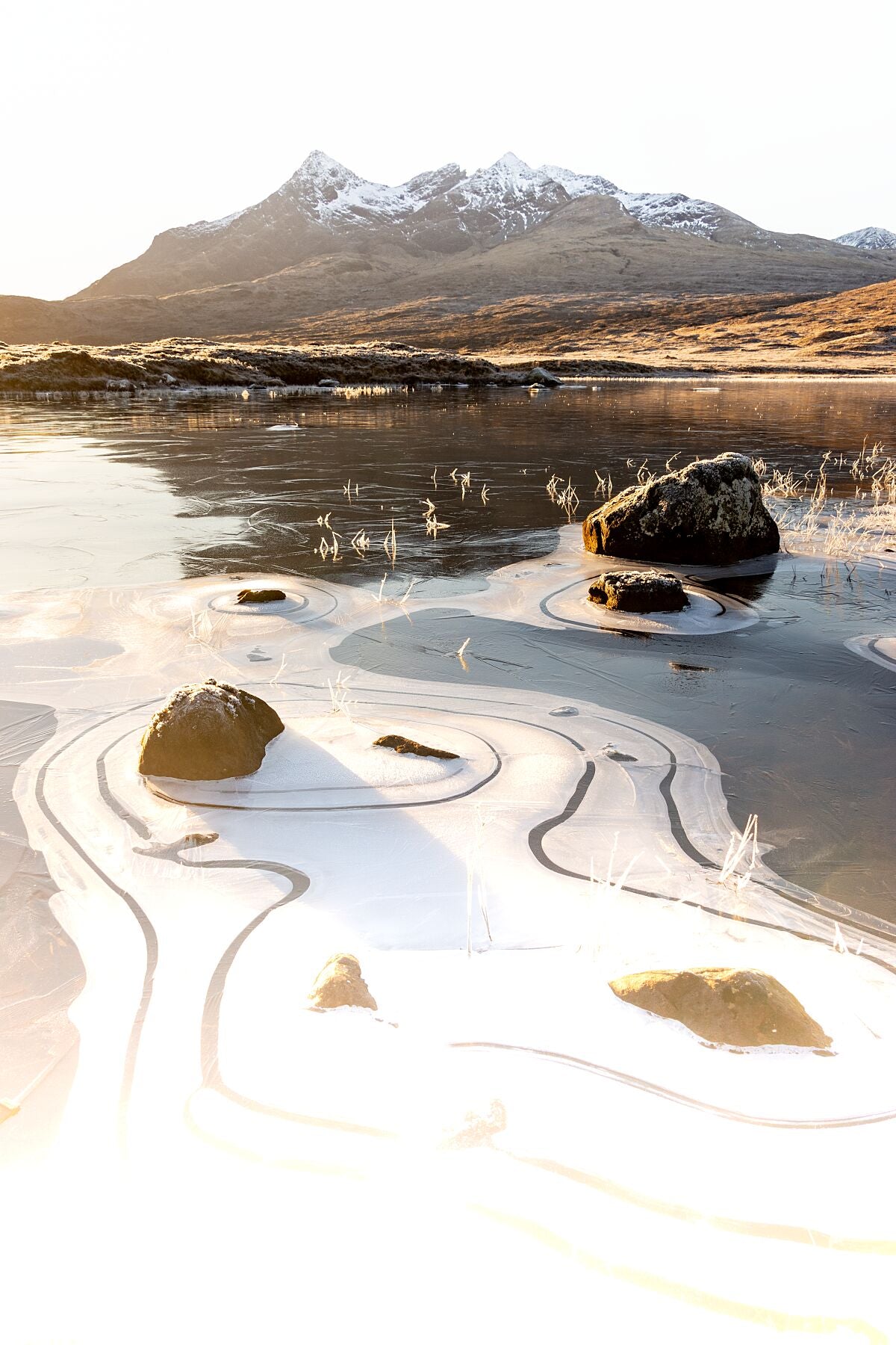 Reflections of the snowy, Cuillin Ridge in the receding tide at Glen Brittle Beach.
This amazing landscape print is available in A3, A2 and A1 sizes, as print only, or with a choice of wooden frames in White, Black and Oak