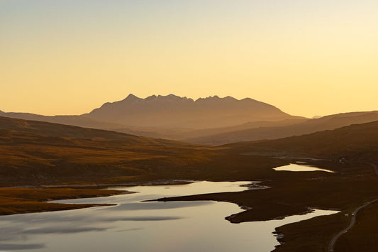 A hazy sunset over Loch Fada and the Cuillin mountains.
This amazing landscape print is available in A3, A2 and A1 sizes, as print only, or with a choice of wooden frames in White, Black and Oak.