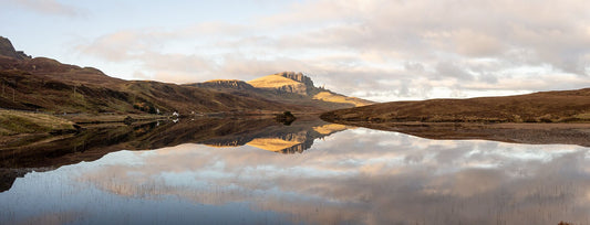 A calm day at Loch Fada with the Old Man of Storr reflected in its still waters.
This amazing landscape is available in A3, A2 and A1 sizes, as print only, or with a choice of wooden frames in White, Black and Oak