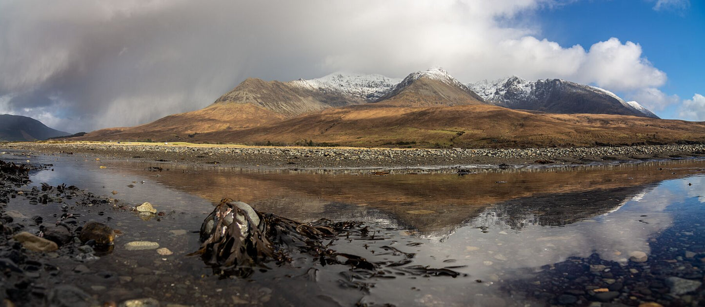 Reflections of the snowy, Cuillin Ridge in the receding tide at Glen Brittle Beach.
This amazing landscape print is available in A3, A2 and A1 sizes, as print only, or with a choice of wooden frames in White, Black and Oak