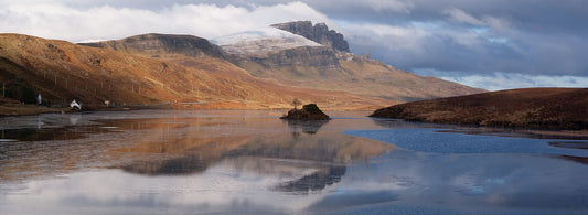 A partially frozen Loch Fada, reflecting the Old Man of Storr.
This amazing landscape is available in A3, A2 and A1 sizes, as print only, or with a choice of wooden frames in White, Black and Oak