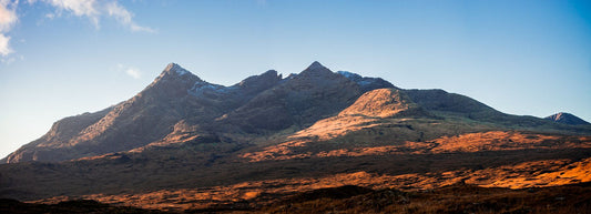 The Cuillin mountains, Isle of Skye, with the Autumn sunrise catching the peaks of Sgurr-nan-Gillean, Am Bhasteir and Sgurr-a-Bhasteir.

This amazing landscape print is available in A3, A2 and A1 sizes, as print only, or with a choice of wooden frames in White, Black and Oak.
