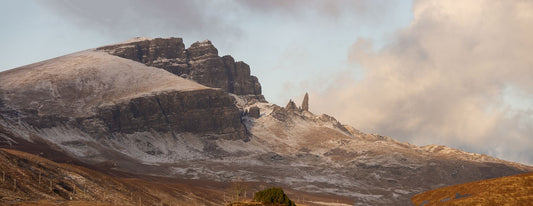 Loch Fada in deep mid-Winter, frozen and dusted with snowfall, and the Old Man of Storr rising above it.

This amazing landscape is available in A3, A2 and A1 sizes, as print only, or with a choice of wooden frames in White, Black and Oak.